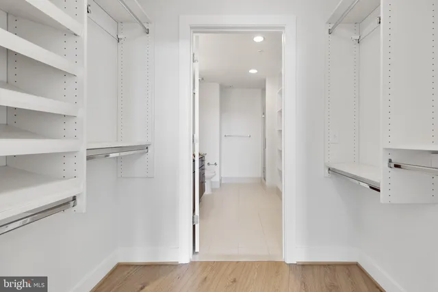 a view of an empty walk in closet