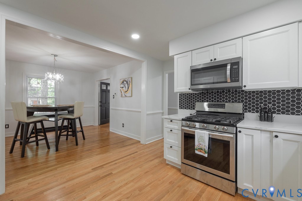 11840 Winfore Drive Midlothian, VA 23113 - Photo 6 of 40 Kitchen featuring white shaker-style cabinetry, st