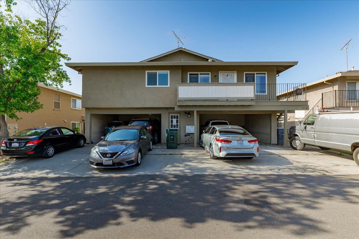 11570 Garnet Way, Unit 4 Auburn, CA 95602 - Photo 1 of 44 a car parked in front of a house