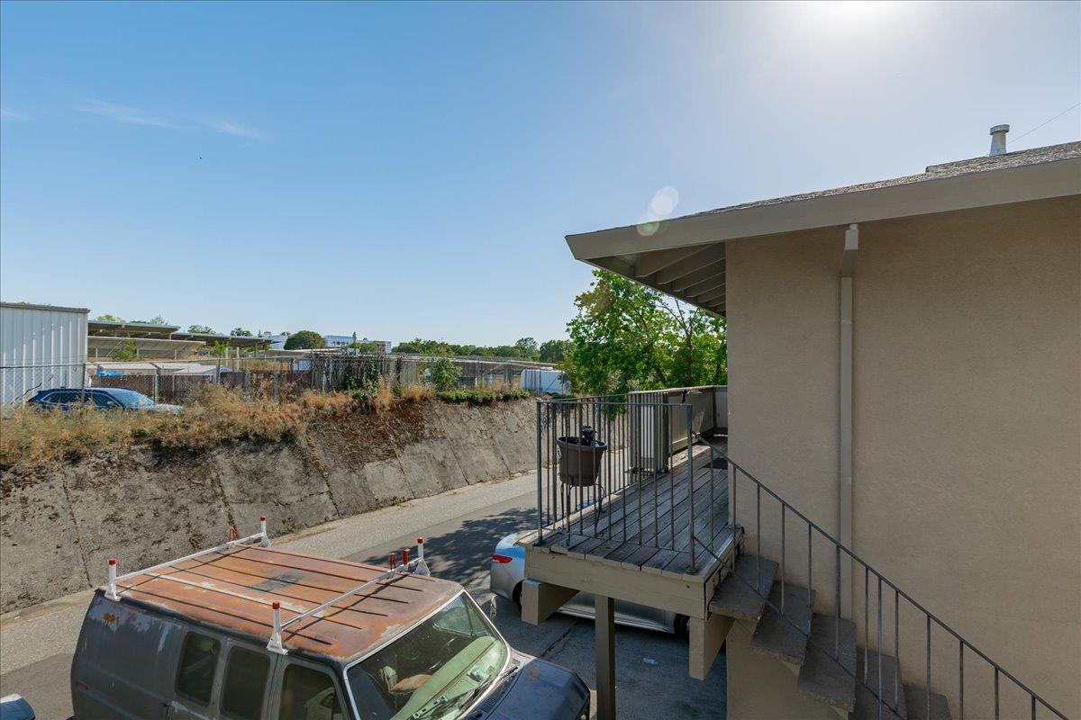 11570 Garnet Way, Unit 4 Auburn, CA 95602 - Photo 35 of 44 a view of house with backyard and outdoor seating