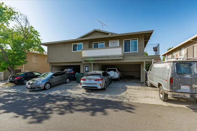 a car parked in front of garage