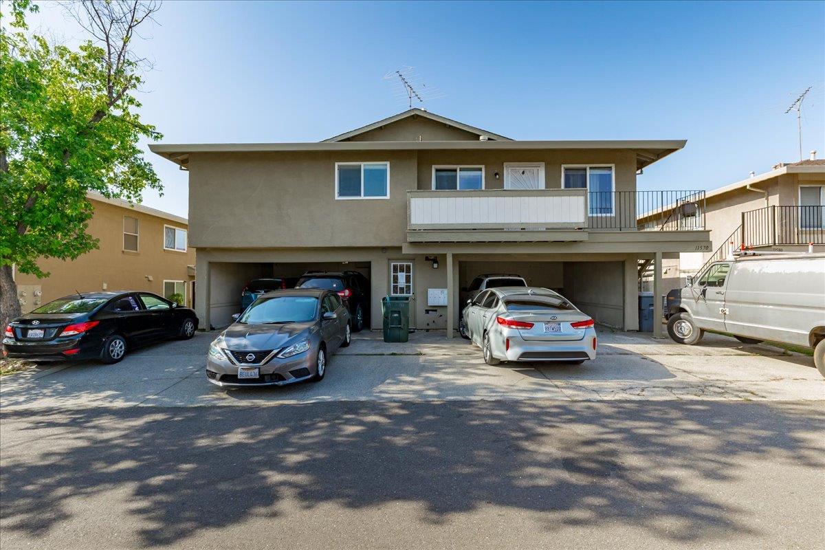 11570 Garnet Way, Unit 4 Auburn, CA 95602 - Photo 39 of 44 a car parked in front of a house