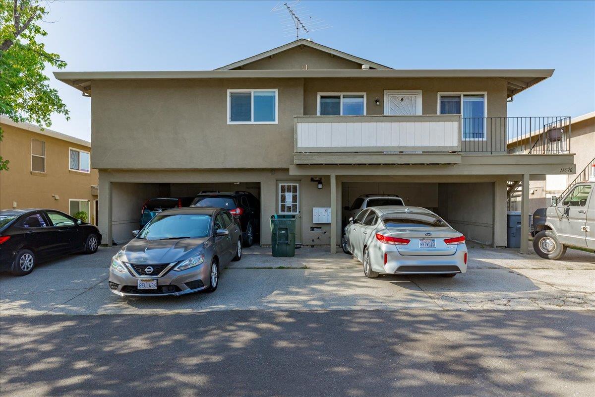 11570 Garnet Way, Unit 4 Auburn, CA 95602 - Photo 40 of 44 a car parked in front of garage