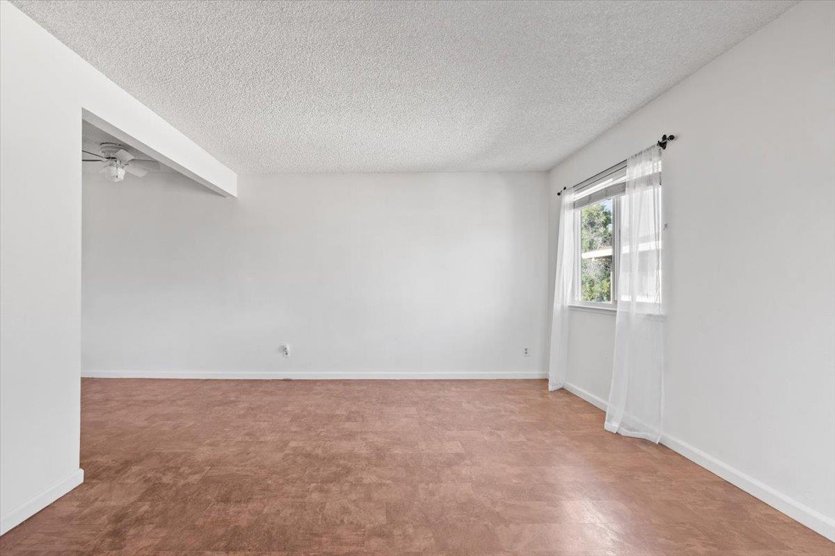 11570 Garnet Way, Unit 4 Auburn, CA 95602 - Photo 5 of 44 an empty room with a window