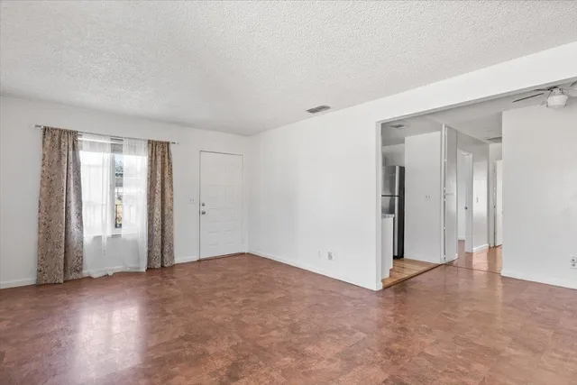 an empty room with window