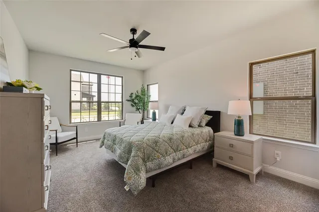 a bathroom with a double vanity sink mirror and double