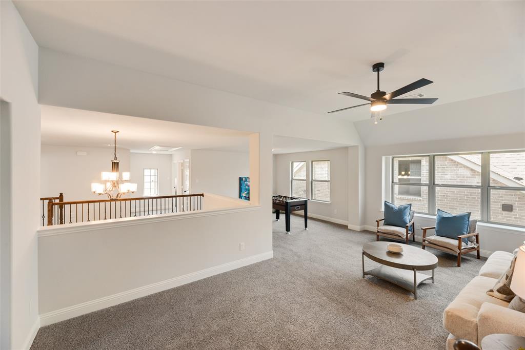 5220 Picasso Road Royse City, TX 75189 - Photo 19 of 28 a living room with furniture and a large window