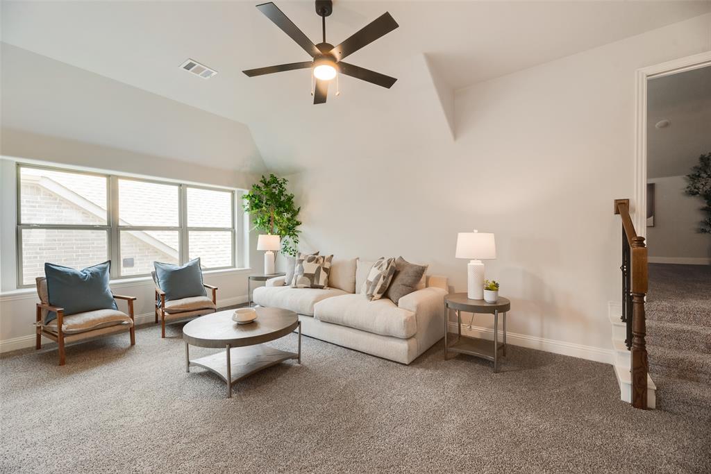 5220 Picasso Road Royse City, TX 75189 - Photo 20 of 28 a living room with furniture and a large window