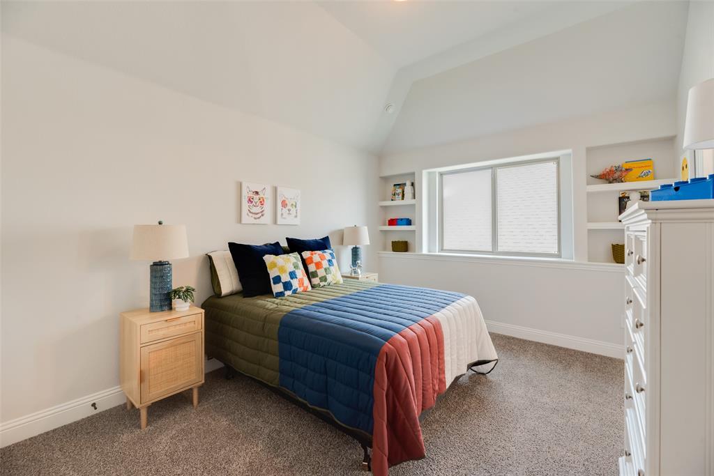 5220 Picasso Road Royse City, TX 75189 - Photo 21 of 28 a bedroom with a bed and a window