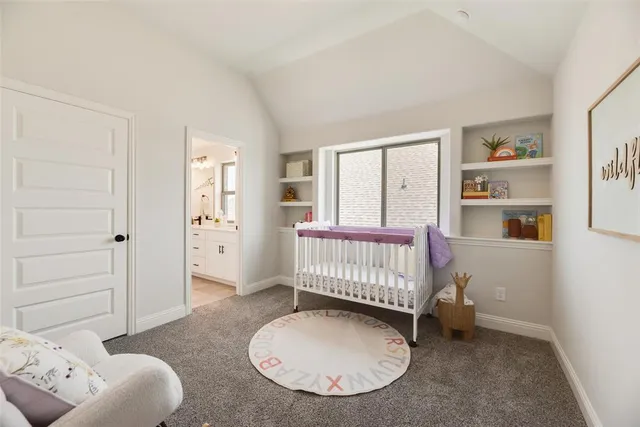 a bed room with a bed and a night stand