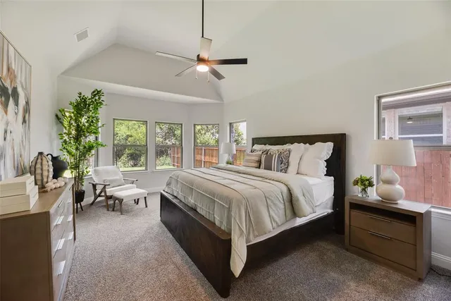 a bathroom with a shower and a bath tub