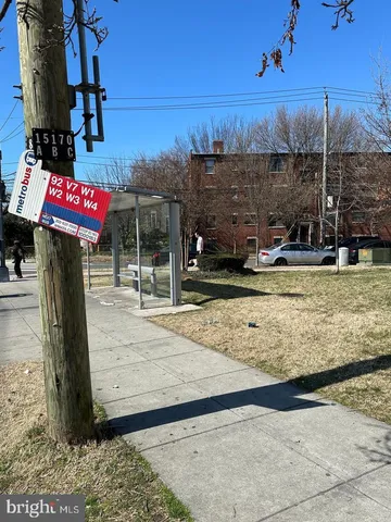 a view of a backyard with sitting area