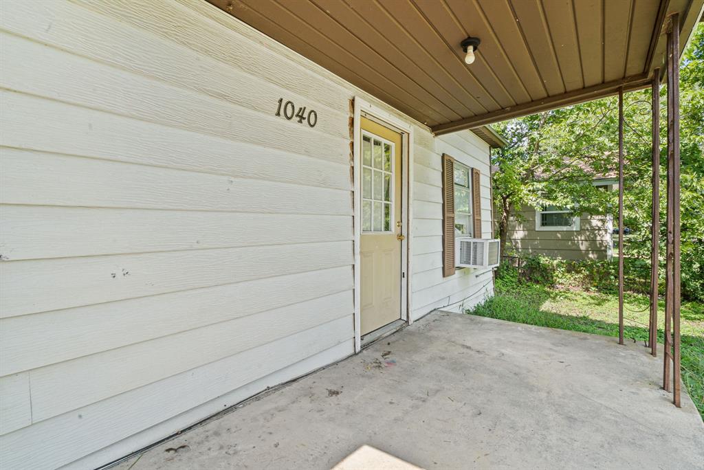 1040 Clinton Avenue Stephenville, TX 76401 - Photo 3 of 26 a view of a pathway with a room