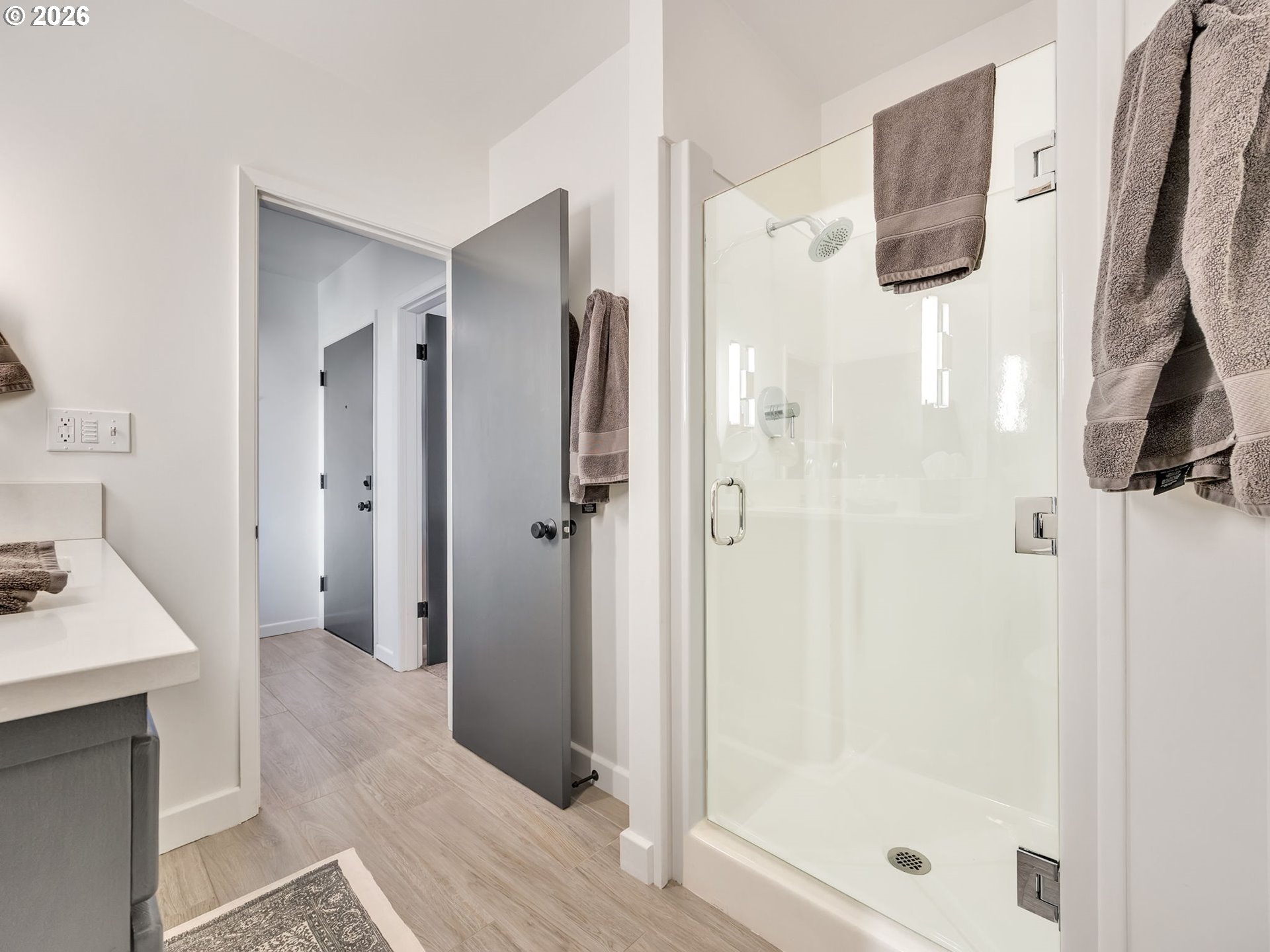 101 13th Street, Unit 211 Gearhart, OR 97138 - Photo 13 of 24 a bathroom with a tub shower and sink