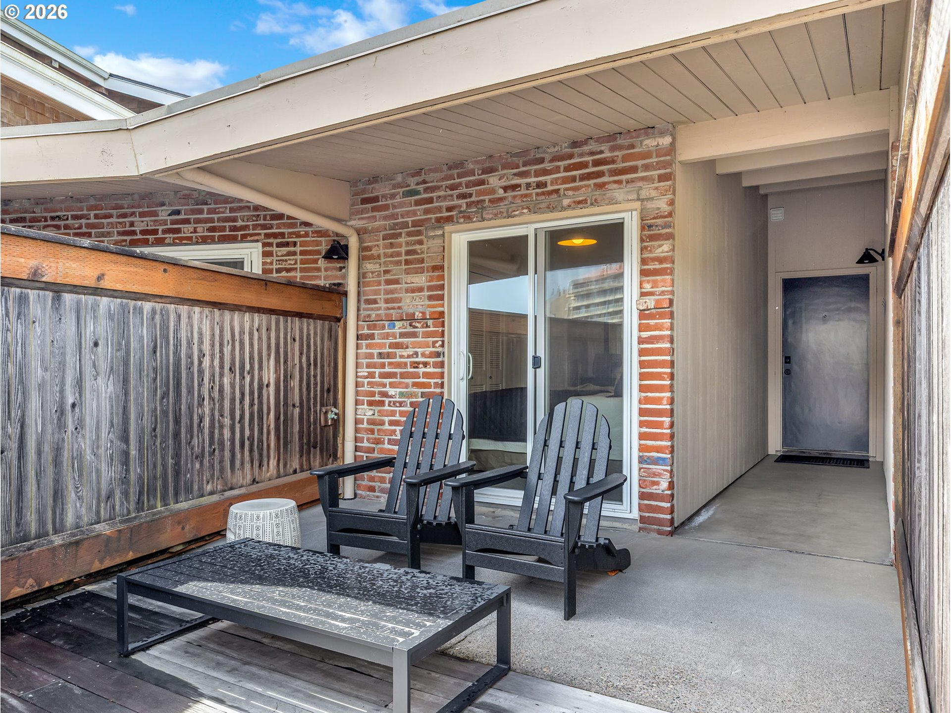 101 13th Street, Unit 211 Gearhart, OR 97138 - Photo 17 of 24 a outdoor living space with furniture