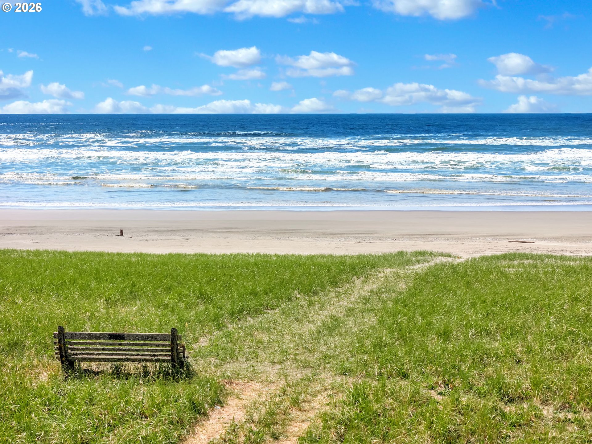 101 13th Street, Unit 211 Gearhart, OR 97138 - Photo 21 of 24 a view of an ocean and beach