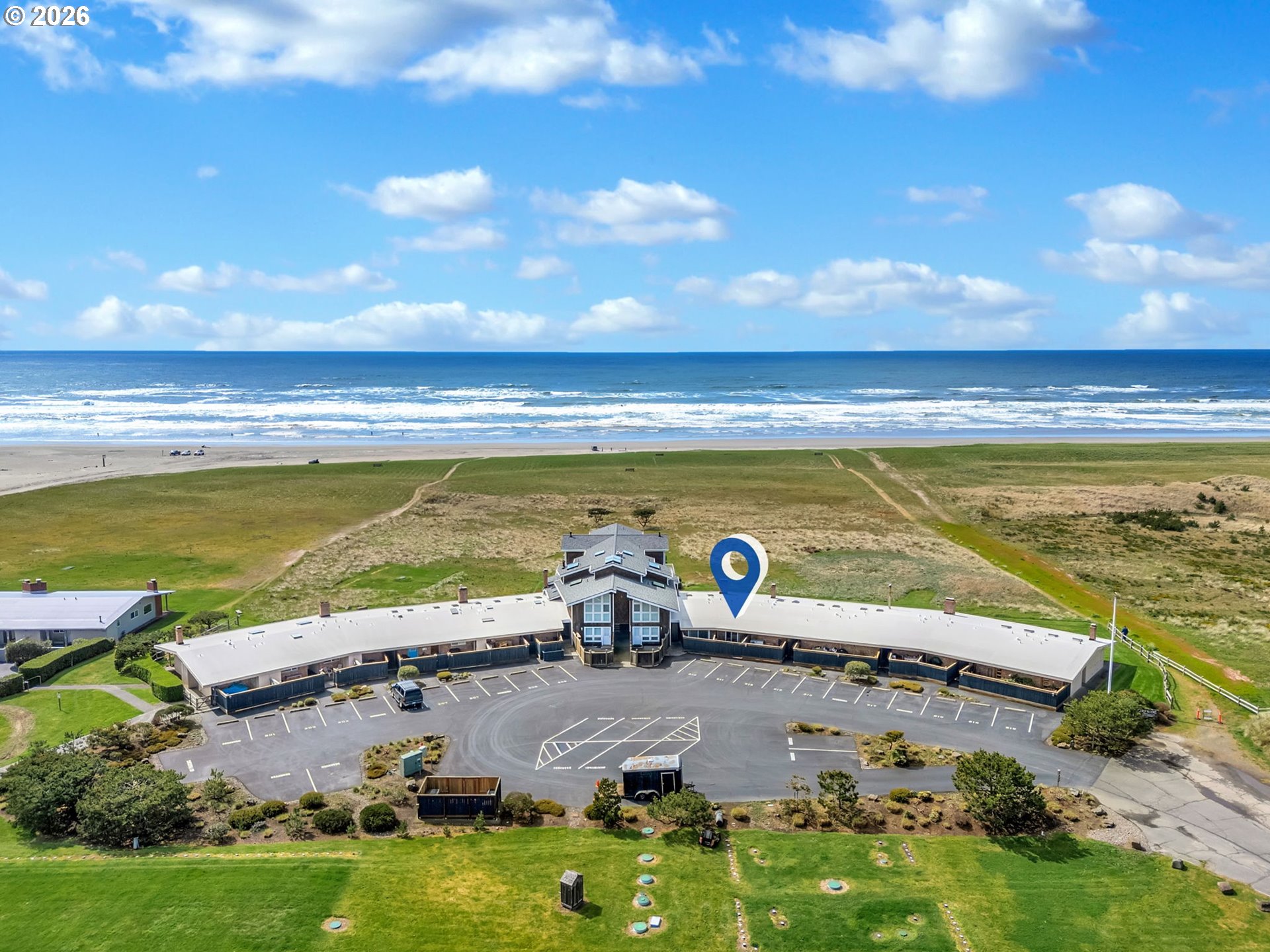 101 13th Street, Unit 211 Gearhart, OR 97138 - Photo 23 of 24 a view of an ocean and beach