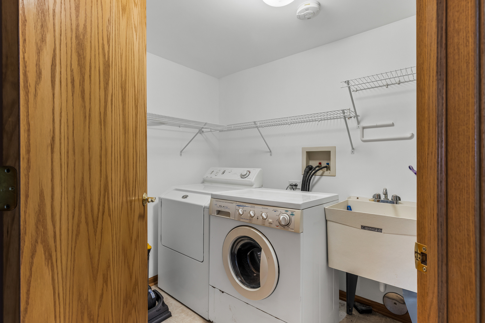 6820 Winding Trail, Unit 101 Oak Forest, IL 60452 - Photo 20 of 21 a utility room with dryer and washer