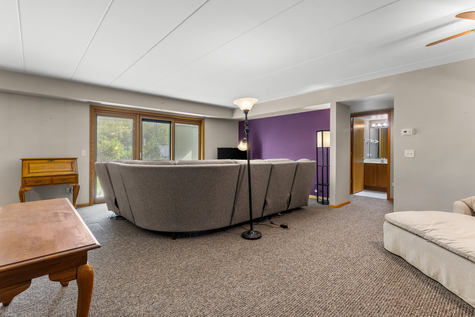 6820 Winding Trail, Unit 101 Oak Forest, IL 60452 - Photo 3 of 21 a living room with a couch and a table