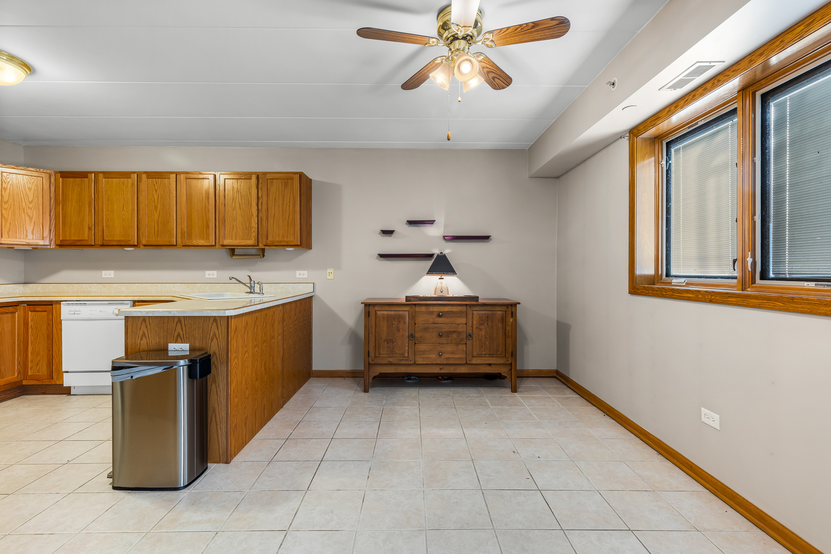 6820 Winding Trail, Unit 101 Oak Forest, IL 60452 - Photo 8 of 21 a kitchen with a stove a sink and a refrigerator