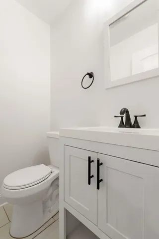 a bathroom with a toilet and a sink
