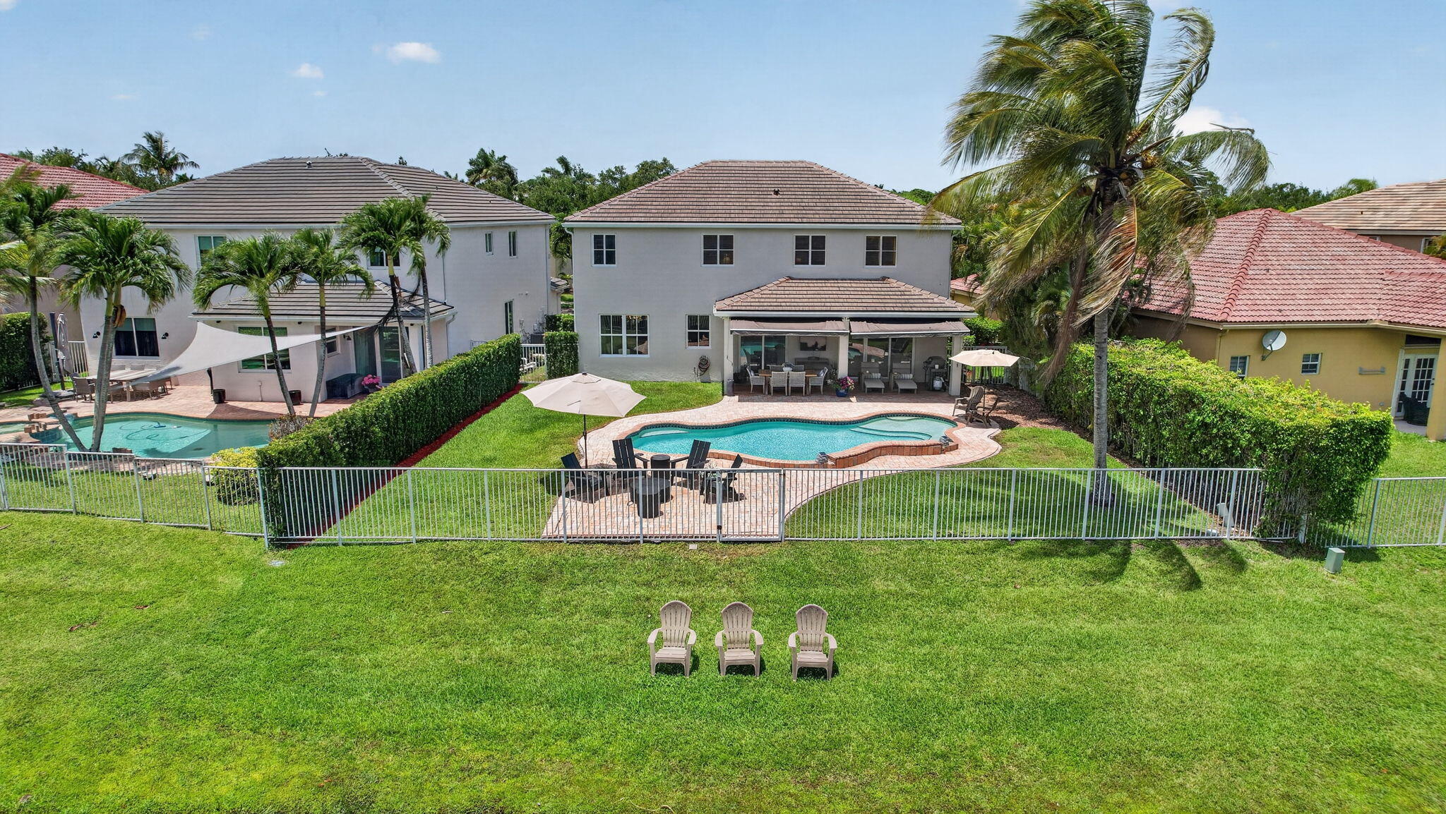 4299 Laurel Ridge Circle Weston, FL 33331 - Photo 3 of 103 a view of a house with a yard and sitting area