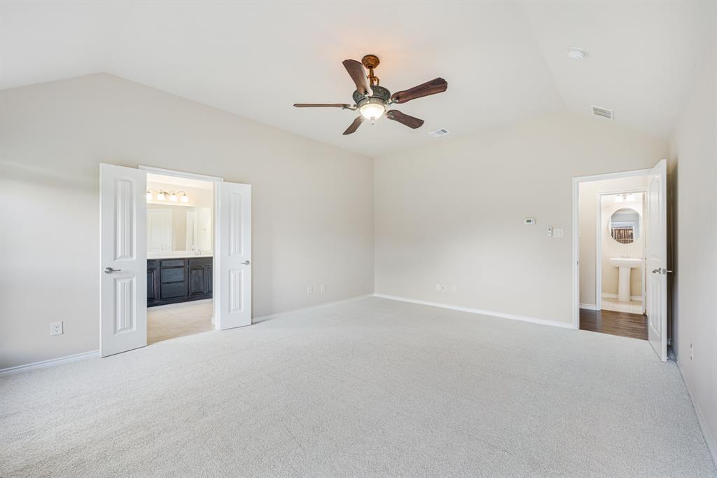 5022 Hidden Creek Road Garland, TX 75043 - Photo 22 of 36 an empty room with windows and entrance