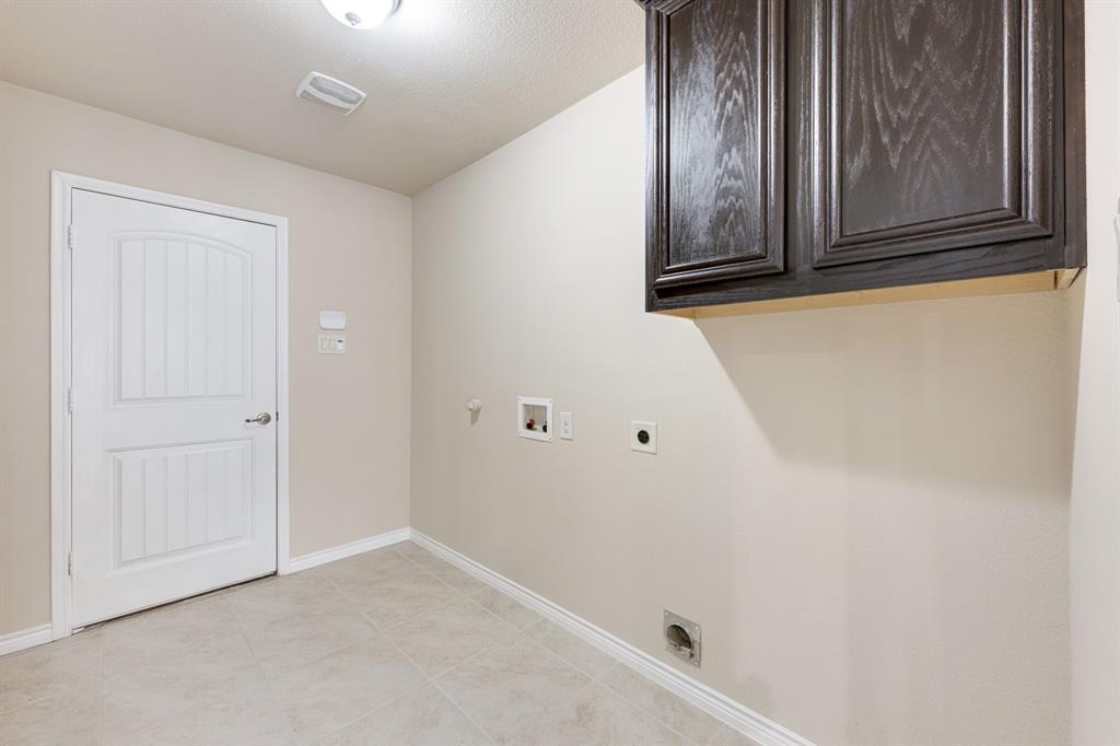 5022 Hidden Creek Road Garland, TX 75043 - Photo 32 of 36 a view of cabinets