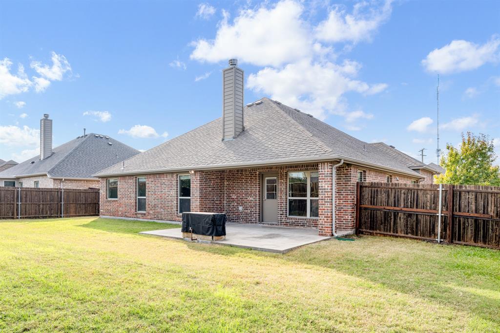 5022 Hidden Creek Road Garland, TX 75043 - Photo 34 of 36 a swimming pool with outdoor seating and yard