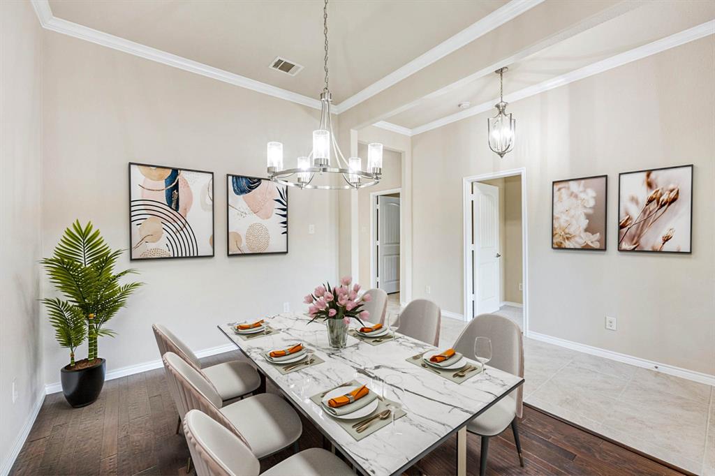 5022 Hidden Creek Road Garland, TX 75043 - Photo 5 of 36 a view of a dining room with furniture and a potted plant