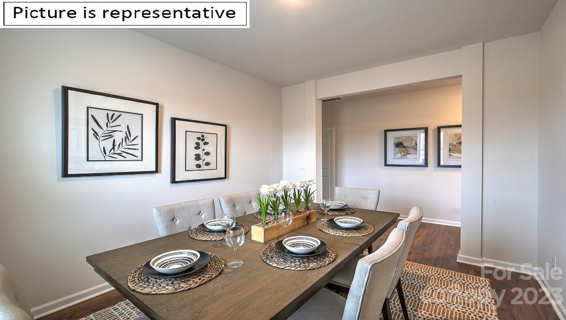142 Flame Azalea Court Locust, NC 28097 - Photo 8 of 40 a view of a dining room with furniture