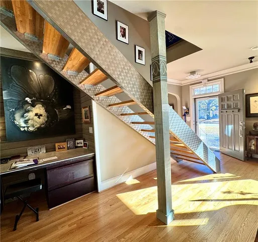 a living room with a fireplace and a table