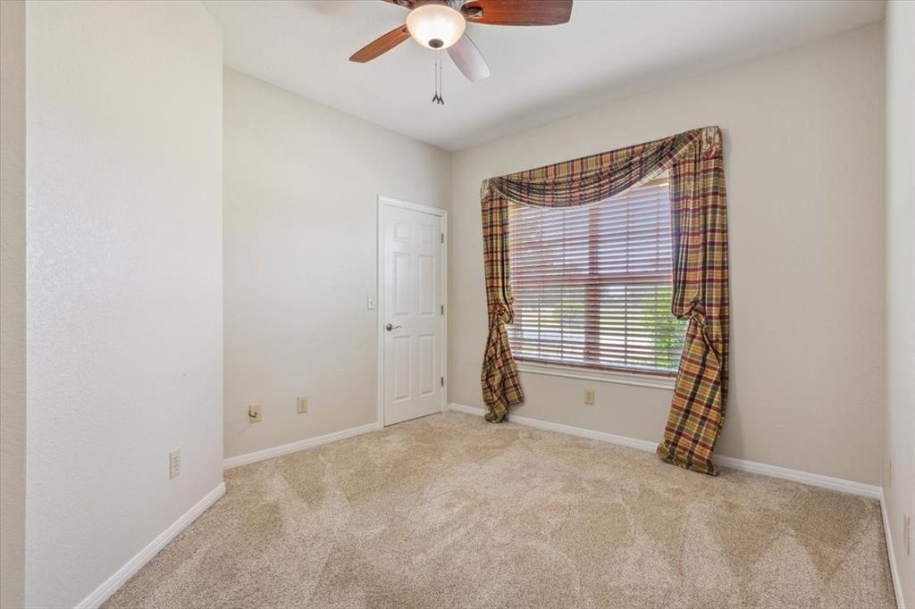 3439 Willow Branch Road McGregor, TX 76657 - Photo 18 of 40 a view of an empty room with a window