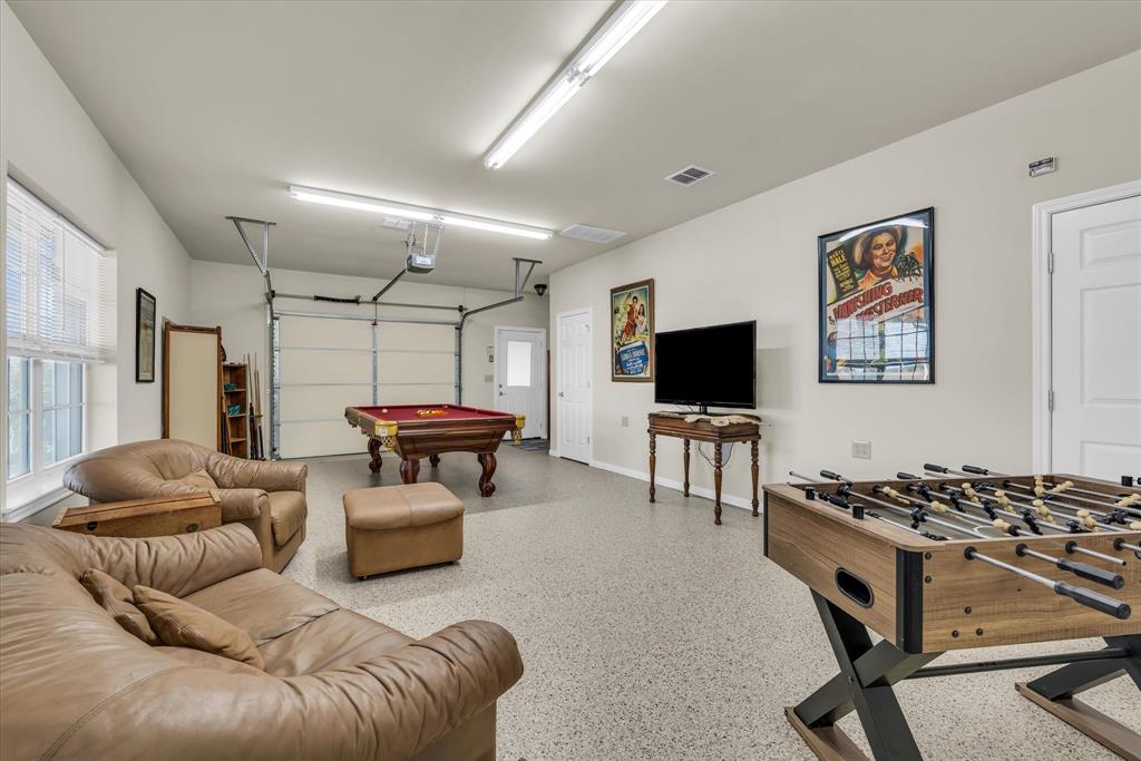 3439 Willow Branch Road McGregor, TX 76657 - Photo 26 of 40 a living room with furniture and a flat screen tv