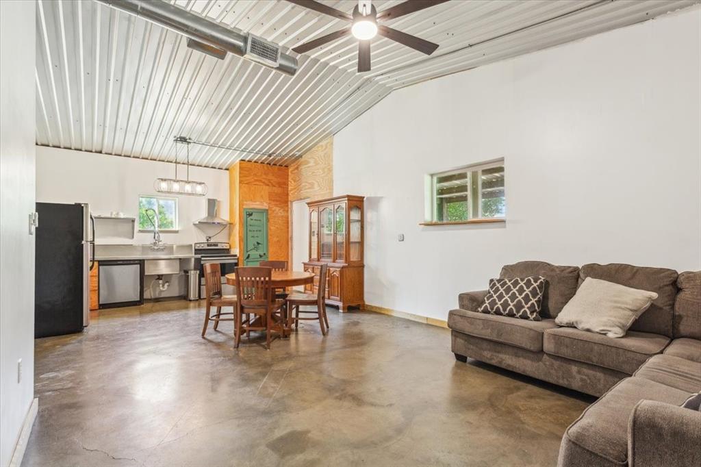 3439 Willow Branch Road McGregor, TX 76657 - Photo 33 of 40 a living room with furniture and a large window