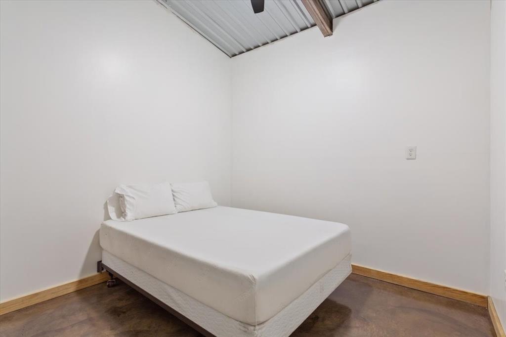 3439 Willow Branch Road McGregor, TX 76657 - Photo 36 of 40 a utility room with a wooden floor