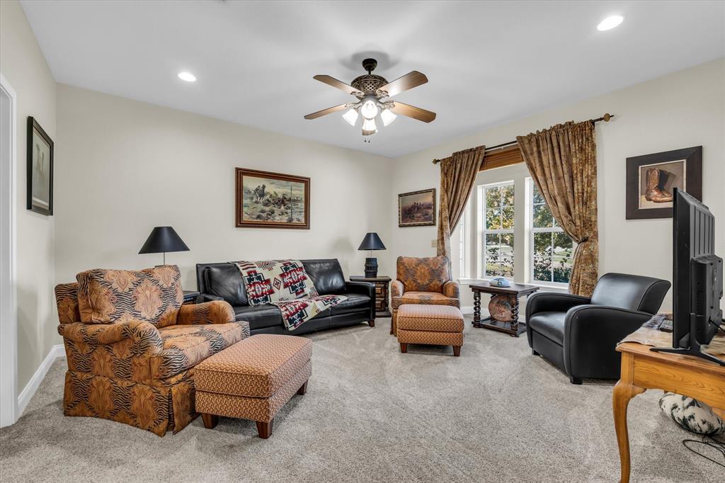 3439 Willow Branch Road McGregor, TX 76657 - Photo 6 of 40 a living room with furniture and a large window
