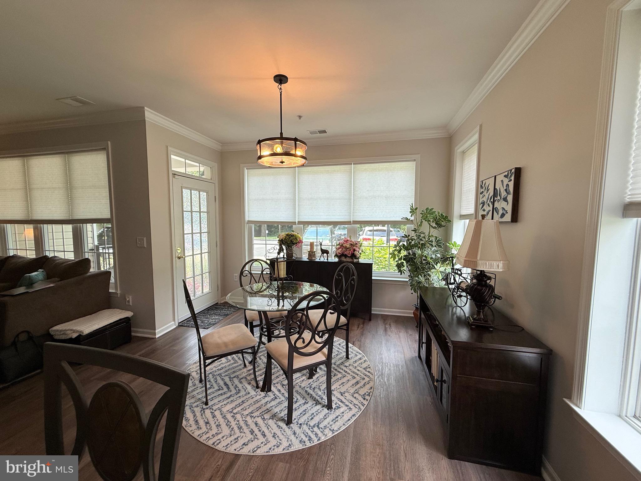 76 Kyle Way Ewing, NJ 08628 - Photo 16 of 38 a living room with furniture and a chandelier