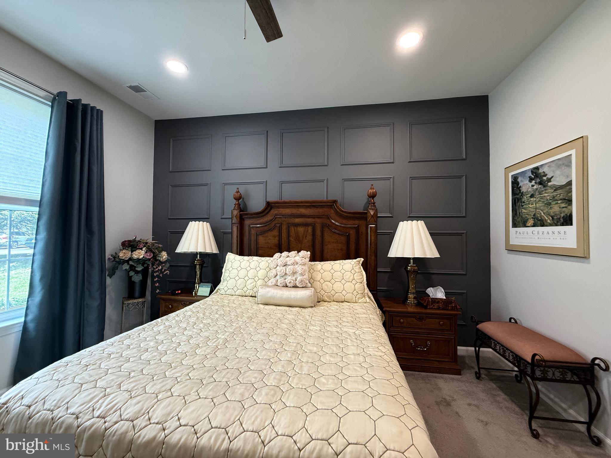 76 Kyle Way Ewing, NJ 08628 - Photo 19 of 38 a bed room with a bed and a lamp