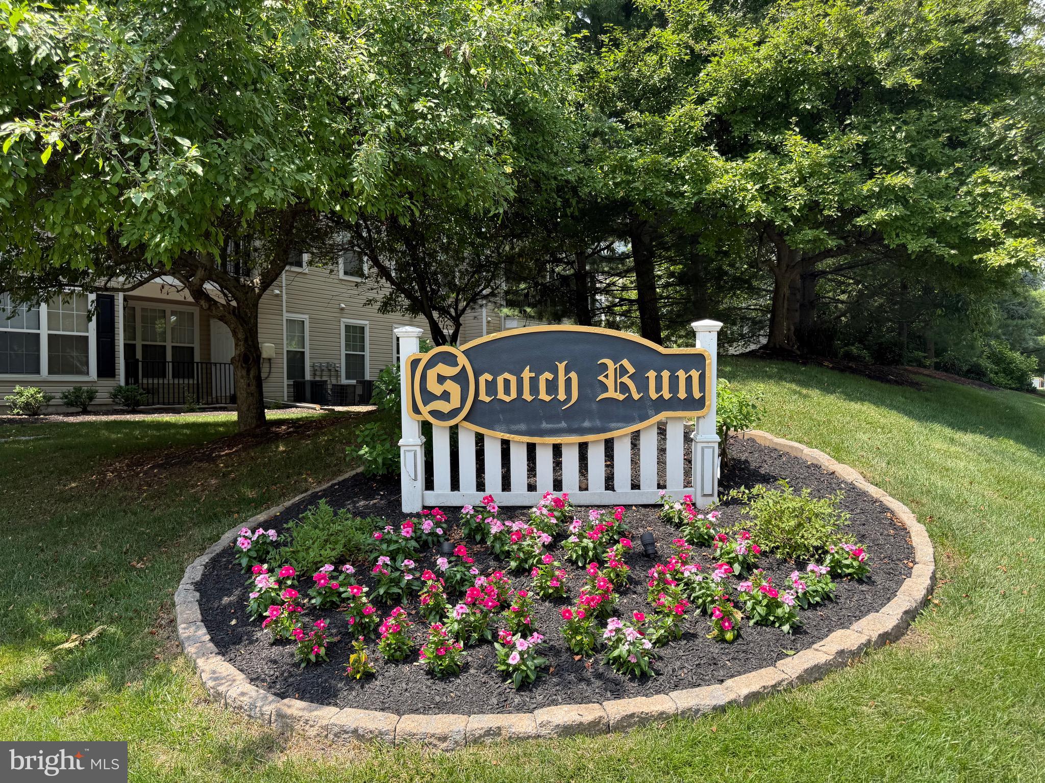 76 Kyle Way Ewing, NJ 08628 - Photo 2 of 38 a view of sign board and garden
