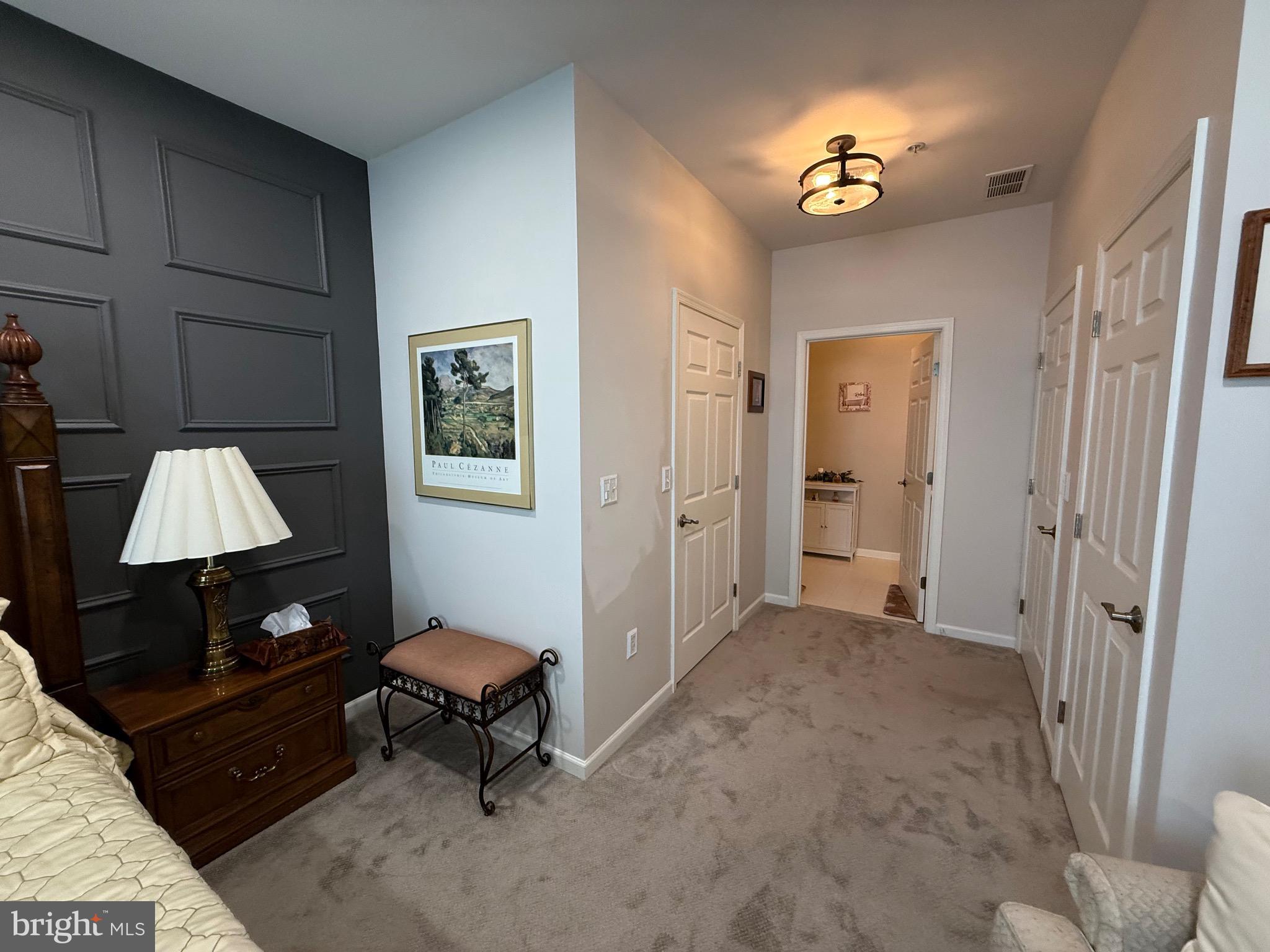 76 Kyle Way Ewing, NJ 08628 - Photo 23 of 38 a living room with furniture a lamp and a window