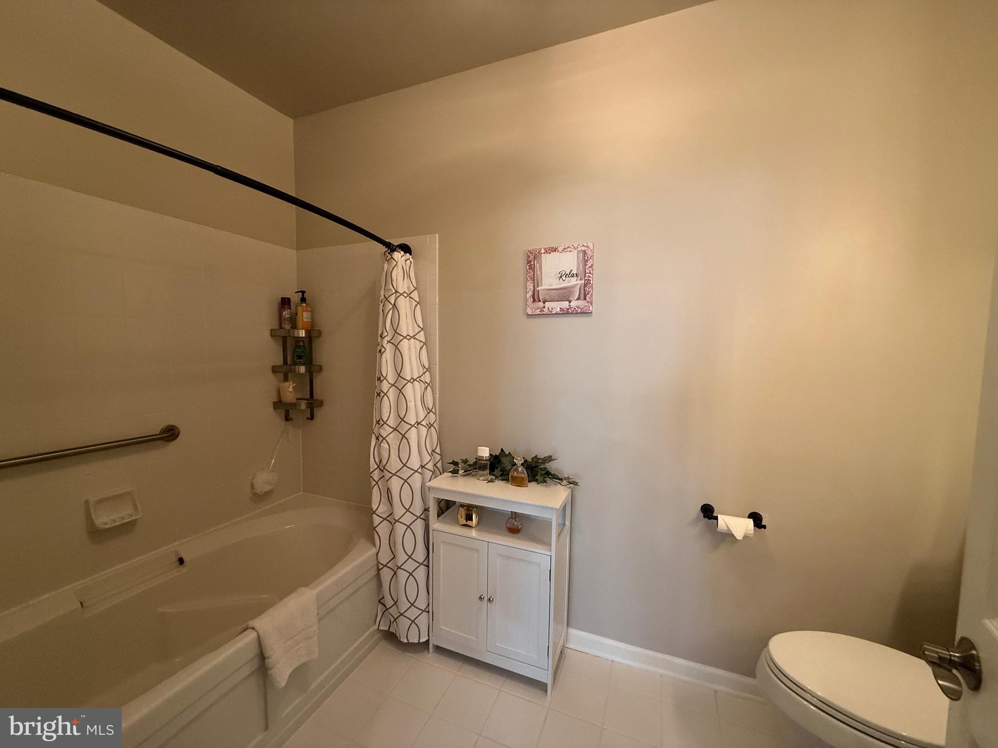 76 Kyle Way Ewing, NJ 08628 - Photo 24 of 38 a bathroom with a sink a toilet and a bathtub