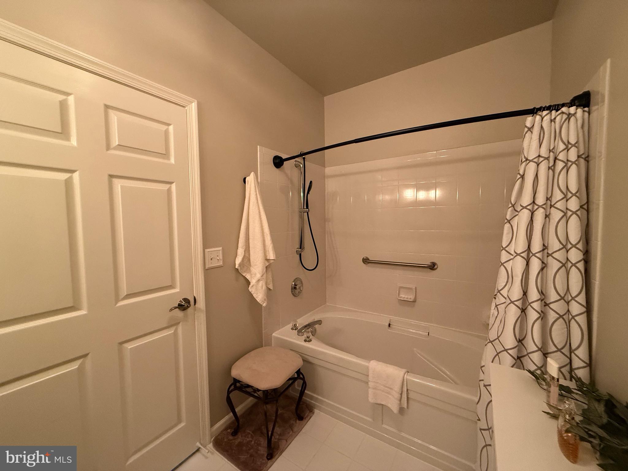 76 Kyle Way Ewing, NJ 08628 - Photo 25 of 38 a bathroom with a bathtub and a shower