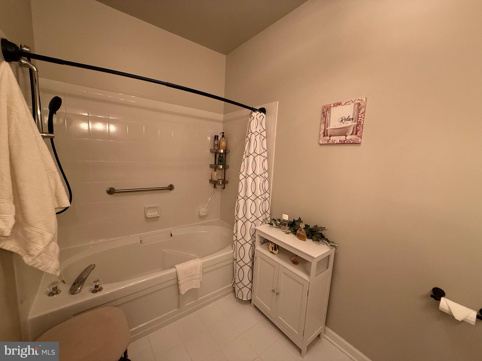 76 Kyle Way Ewing, NJ 08628 - Photo 27 of 38 a bathroom with a bathtub and a shower