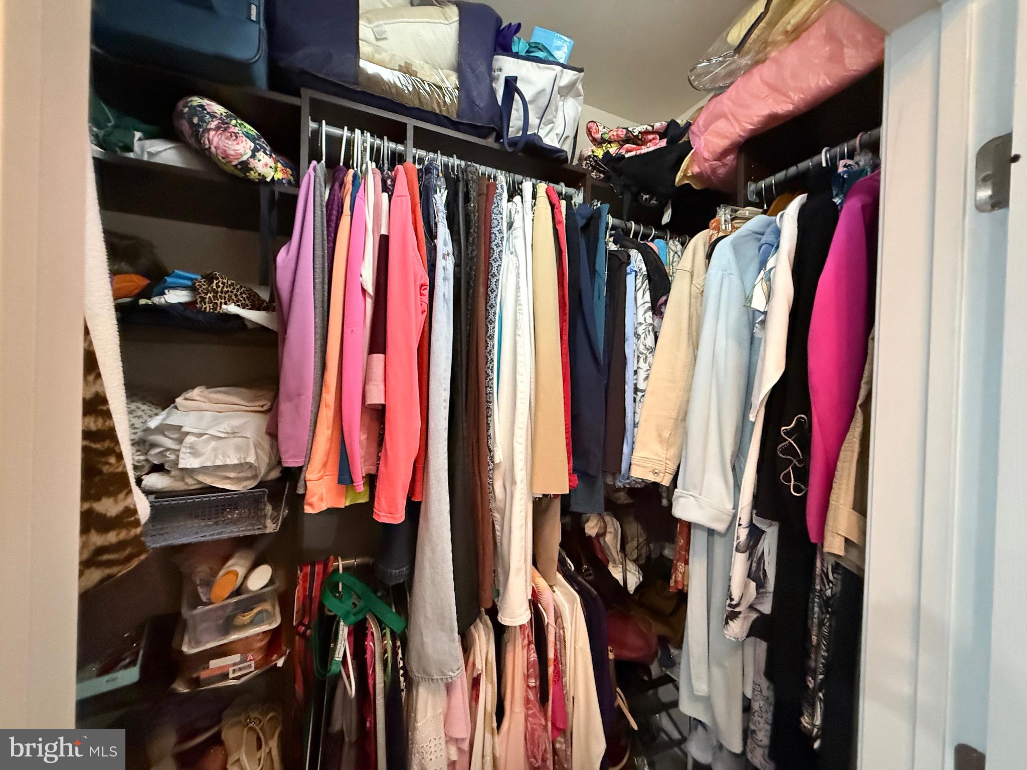 76 Kyle Way Ewing, NJ 08628 - Photo 28 of 38 a view of walk in closet with clothes and shoes