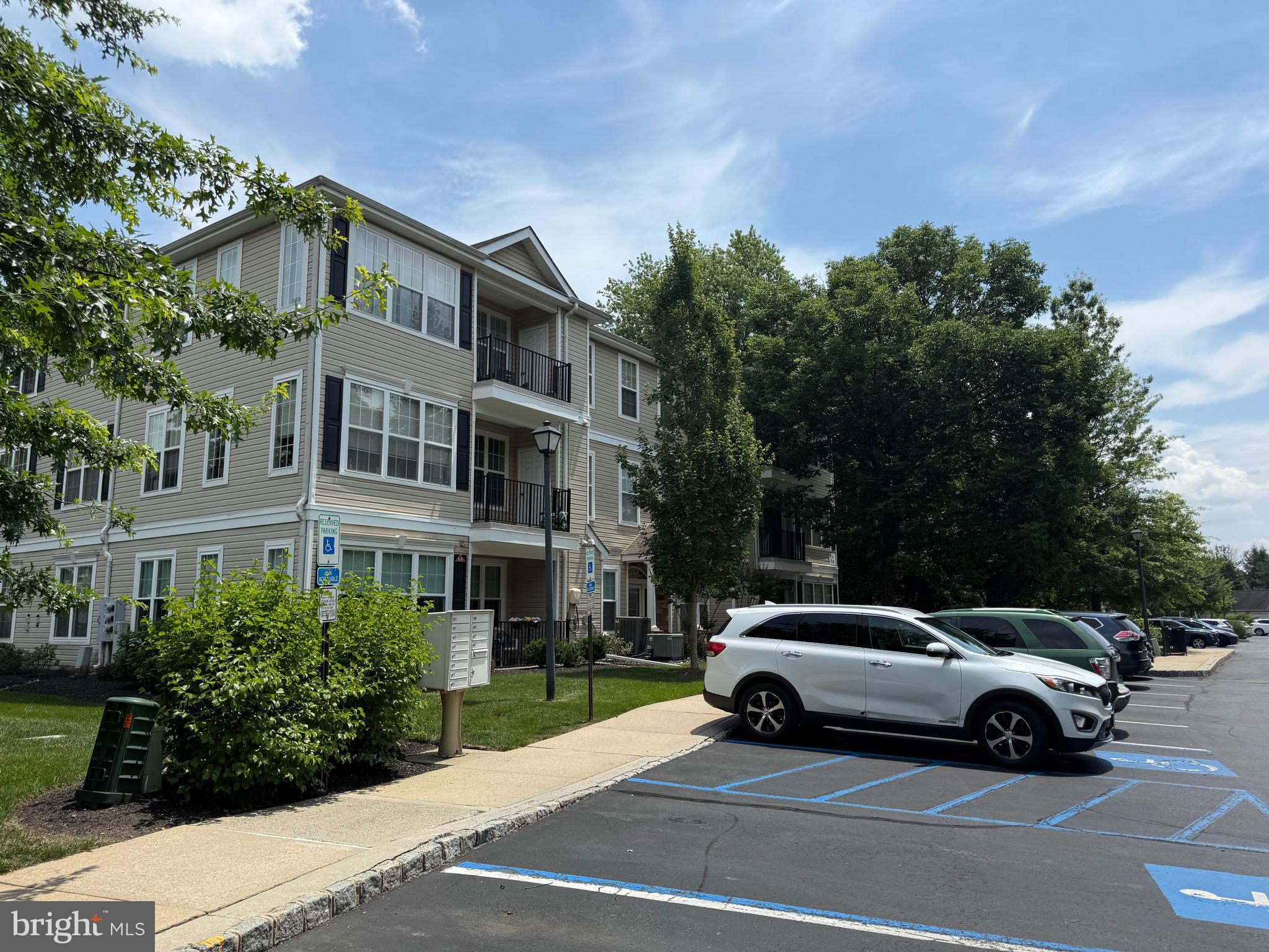 76 Kyle Way Ewing, NJ 08628 - Photo 3 of 38 a view of a cars parked in front of a house