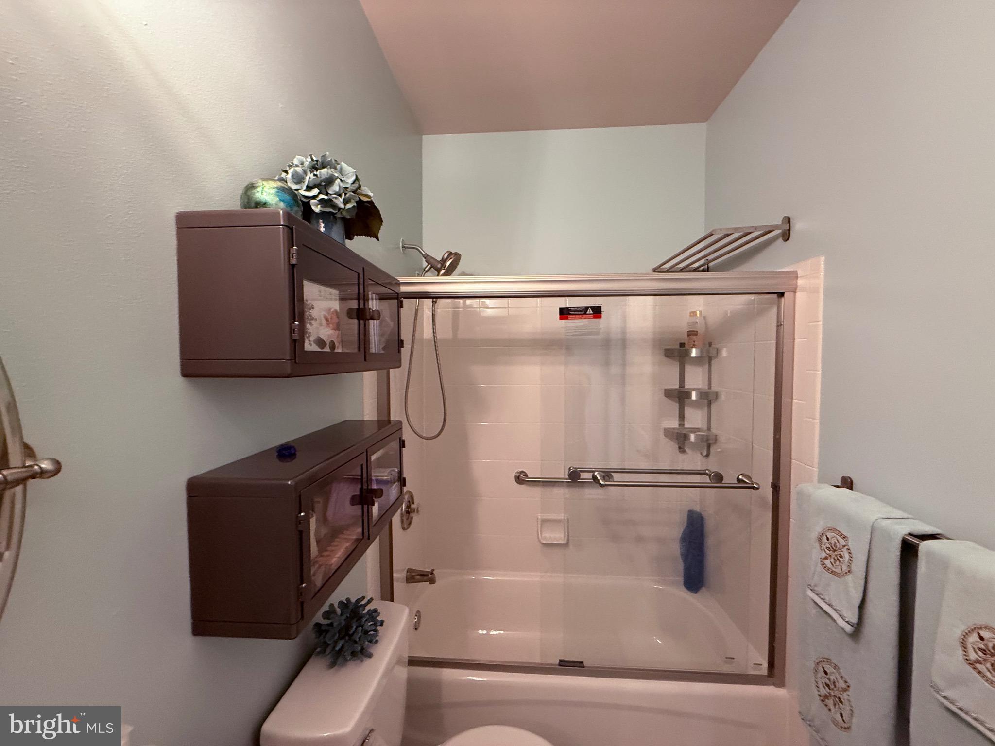 76 Kyle Way Ewing, NJ 08628 - Photo 33 of 38 a bathroom with a bathtub shower sink and vanity