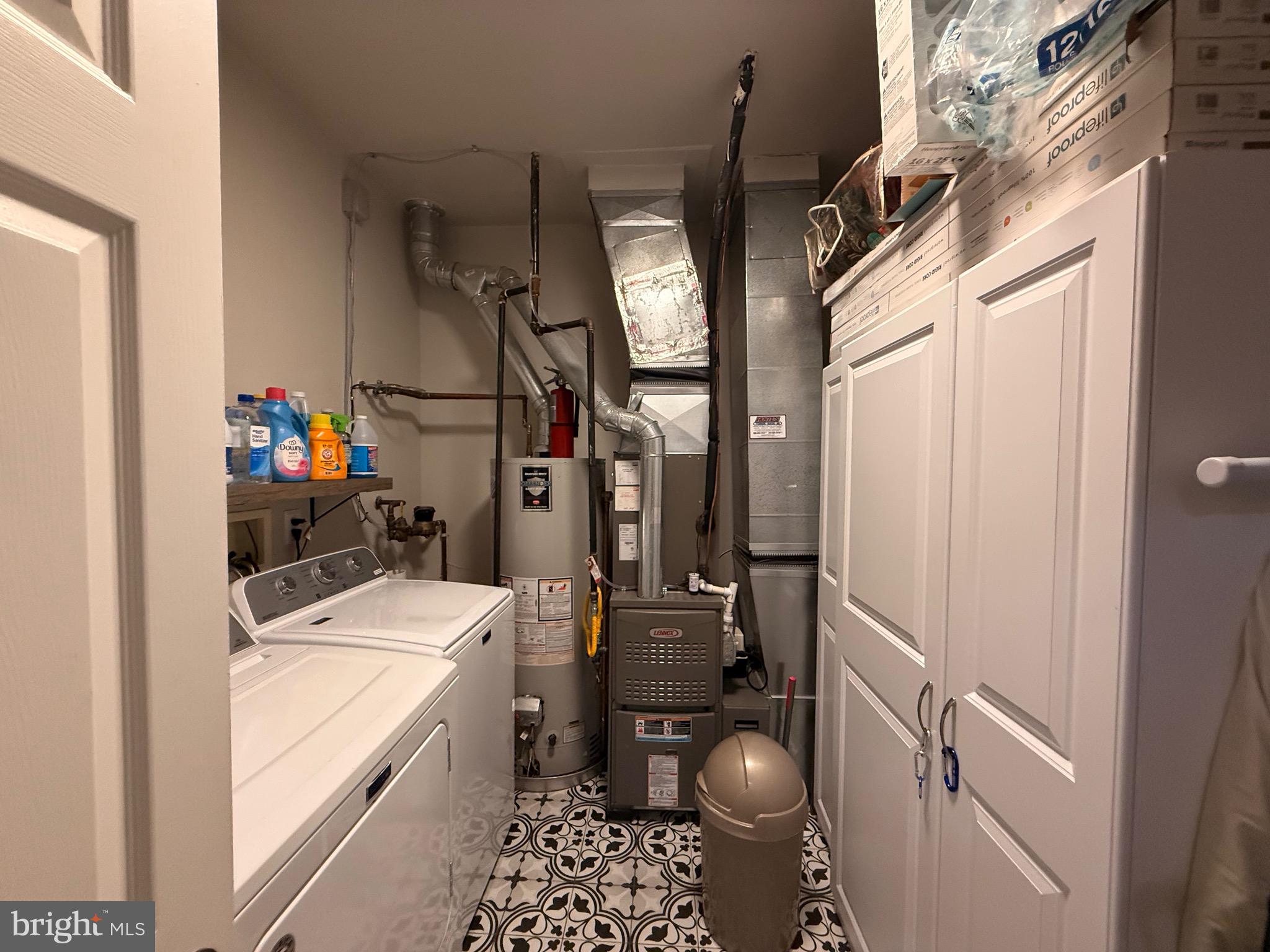 76 Kyle Way Ewing, NJ 08628 - Photo 35 of 38 a storage room with washer and dryer