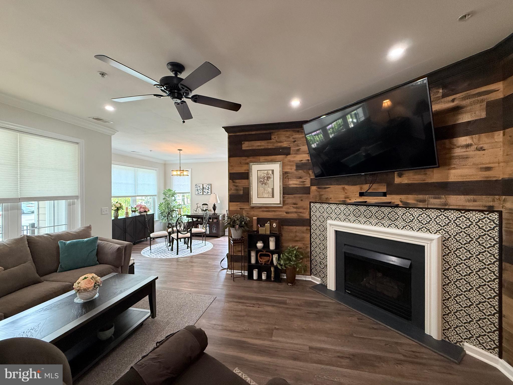 76 Kyle Way Ewing, NJ 08628 - Photo 8 of 38 a living room with furniture and a fireplace