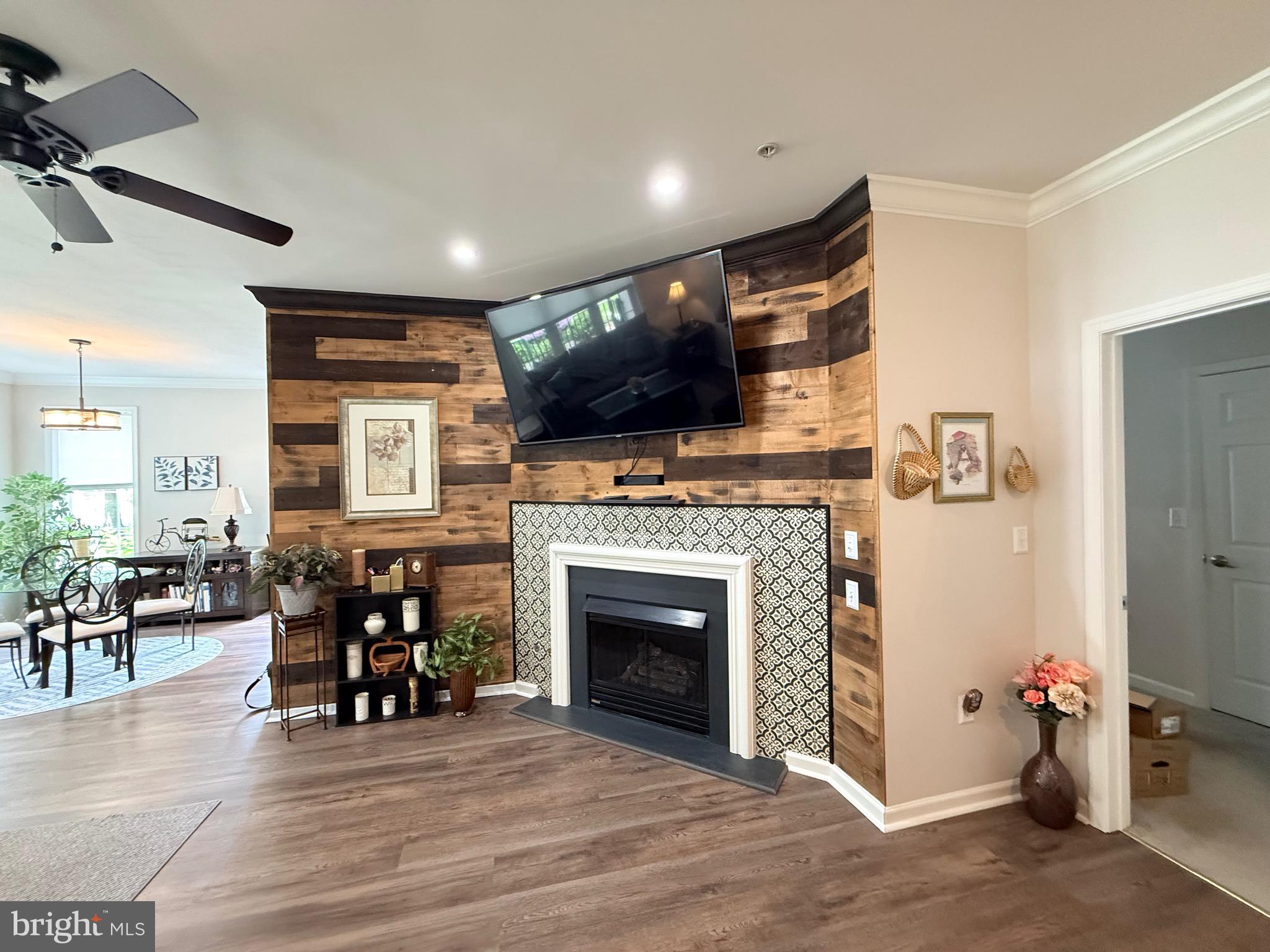 76 Kyle Way Ewing, NJ 08628 - Photo 9 of 38 a living room with furniture and a fireplace